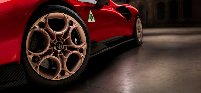 Gold alloy wheels paired with coloured Brembo carbon-ceramic brakes